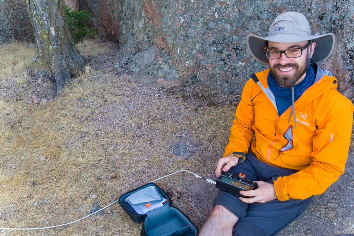 Brenton Salmi, KB1LQD, operating his KX2 radio during a SOTA activation of Hawkins Peak in the Pinnacles National Park.