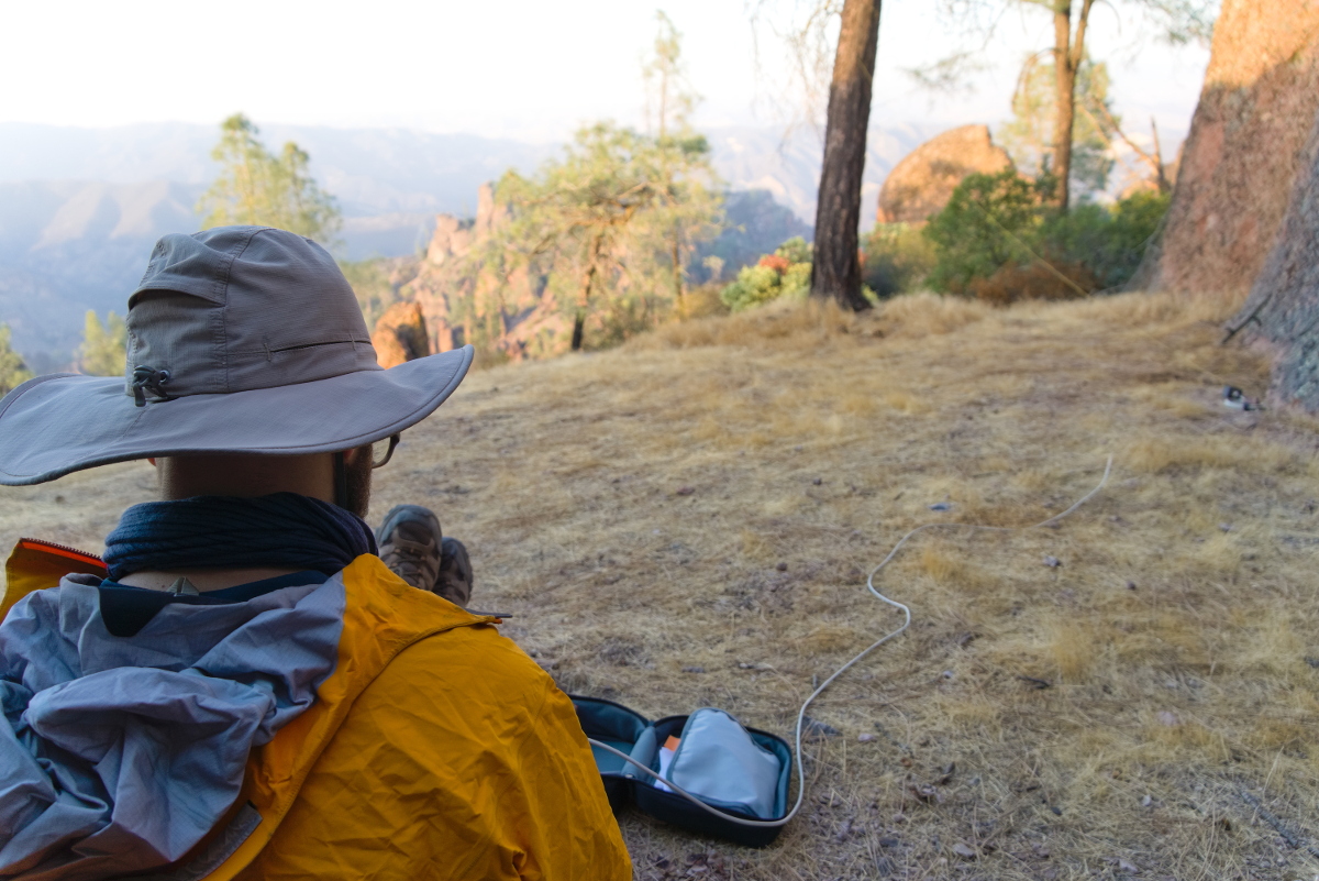 Brenton Salmi, KB1LQD, operating his KX2 radio during a SOTA activation of Hawkins Peak in the Pinnacles National Park.