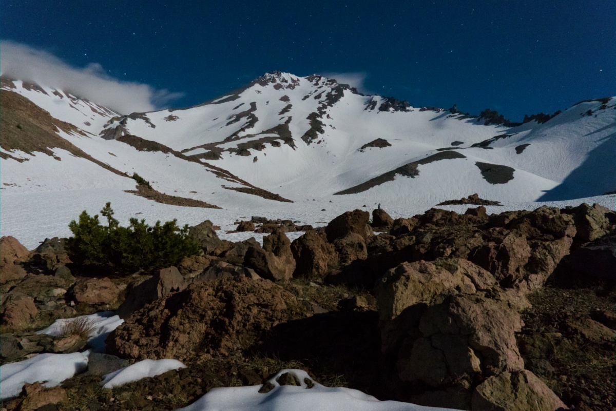 A moonlit night photo of the Mt. Shasta West Face.
